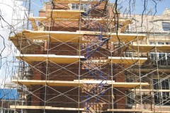 Scaffolding around building being restored