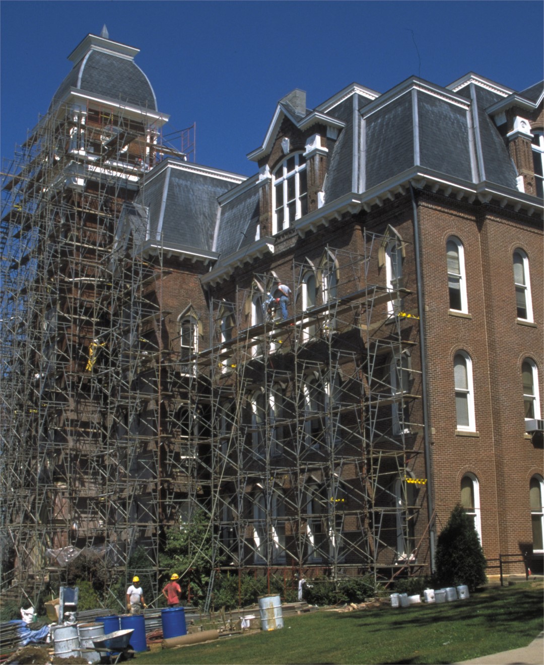 scaffolding outside of a large house