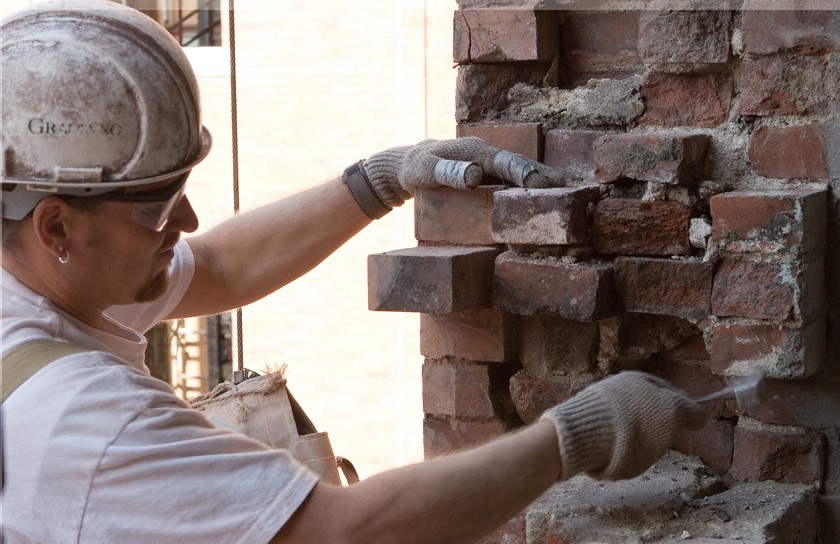 man doing brickwork