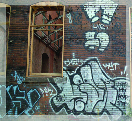 Cork Factory facade covered in graffiti before restoration