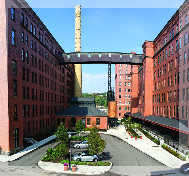 Cork Factory courtyard with restored brick stack and skybridge